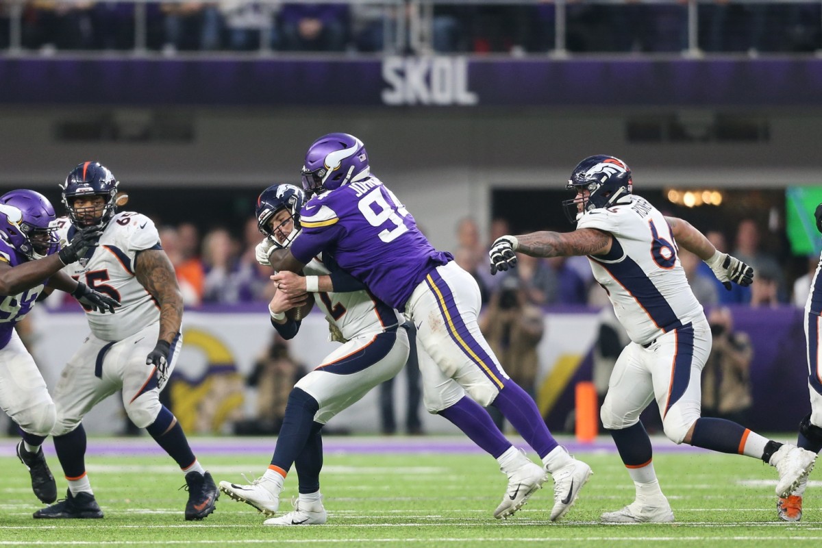 Minnesota Vikings defensive lineman Jaleel Johnson (94) sacks Denver quarterback Brandon Allen (2). Mandatory Credit: Ben Ludeman-USA TODAY Sports